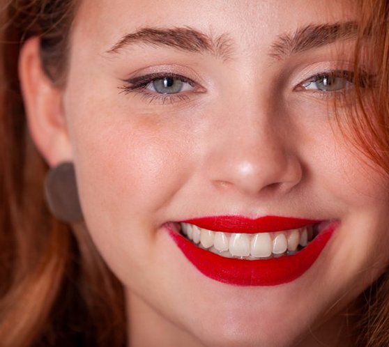 Close up of confident woman smiling