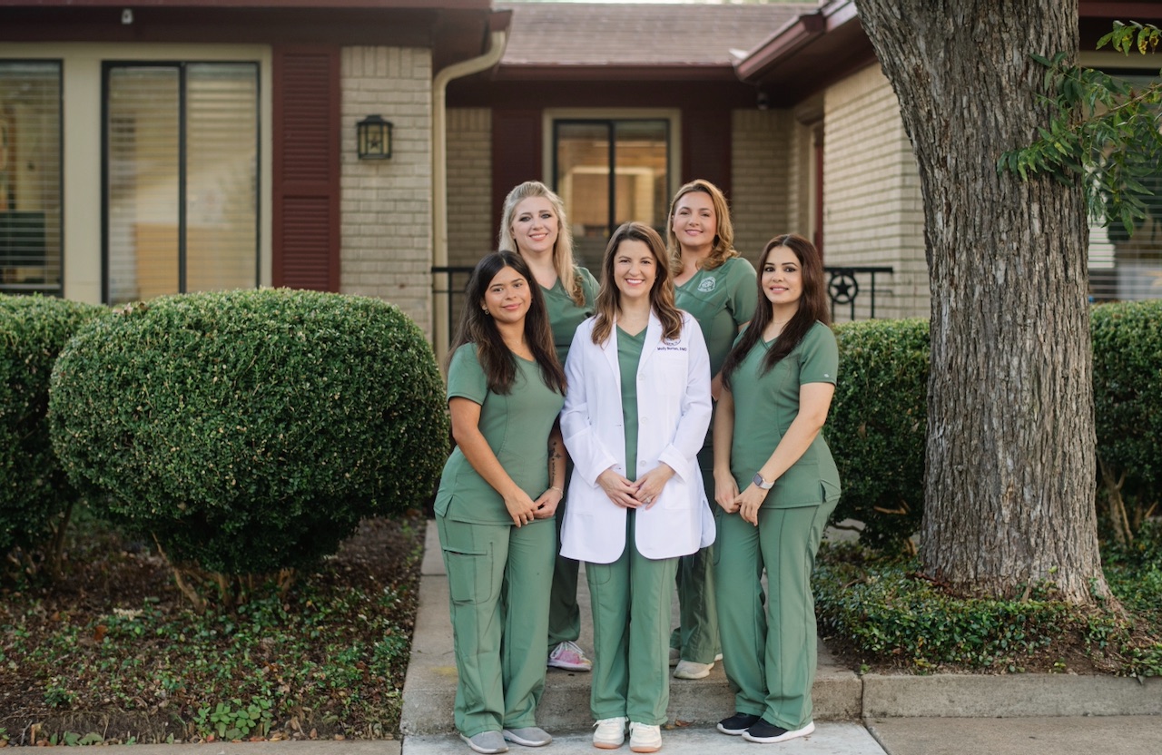 The Magnolia Family Dentistry team standing in front of our South Austin office